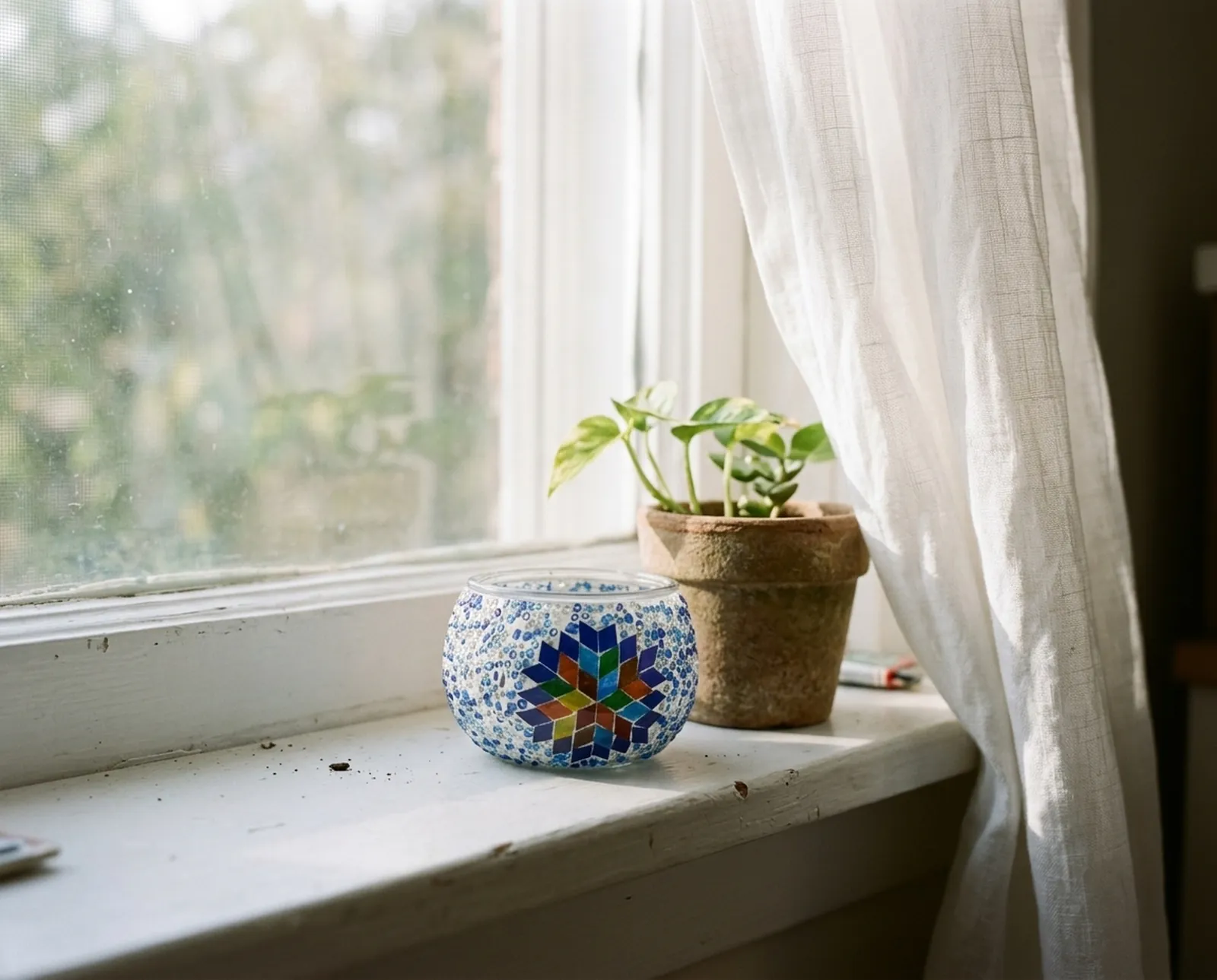 Mosaic Candle Holder in Butterfly, on the windowsill